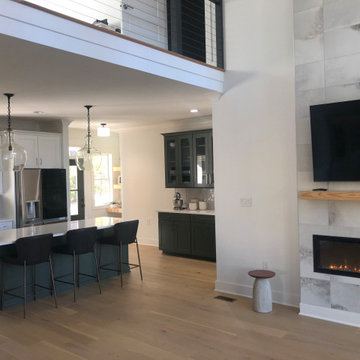 Open-Concept Main Level with Two-Story Ceiling, Cable Railing Loft & Fireplace F