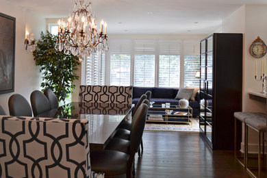 Example of a mid-sized transitional dark wood floor kitchen/dining room combo design in Orange County with white walls and no fireplace