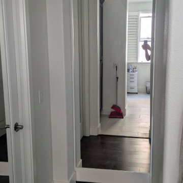 Lucia 1299 White Barn door with black hardware and softcloses