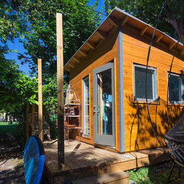 Modern Art Studio Natural 1x12 Pine Siding fully Insulated