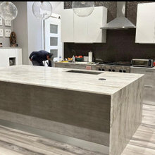 Matarazzo Quartzite 2cm with book matched waterfalls Mitered edges in M