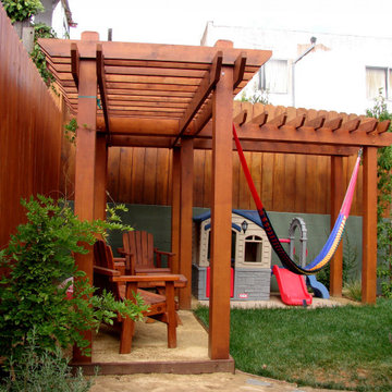 L-Shaped Pergola with Hammock over Playhouse and Seating