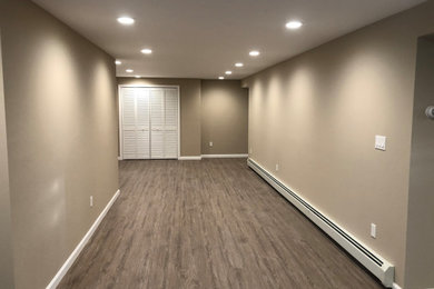 Example of a trendy basement design in New York