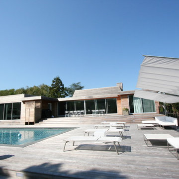 Contemporary with Wood Decking Throughout