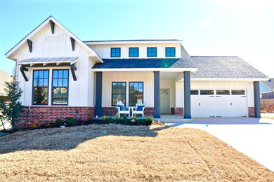 Country white one-story exterior home photo in Oklahoma City