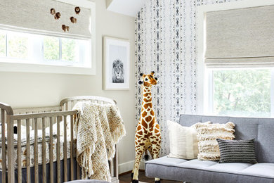 Inspiration for a mid-sized transitional gender-neutral nursery in DC Metro with beige walls, carpet and beige floor.