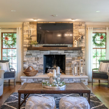 Fireplace with natural stone and wood mantle
