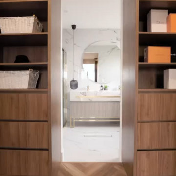 Custom Walk-In Wardrobe Passage Leading To Luxury Ensuite
