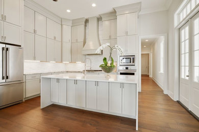 Example of a transitional kitchen design in New Orleans