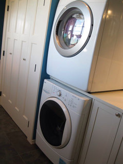 Stacking Washer And Dryers Of Diffe Makes These Are Stacked But There Is A Shelf In Between I Think The Stacking Kits Not Intended To Stack Diffe Brands