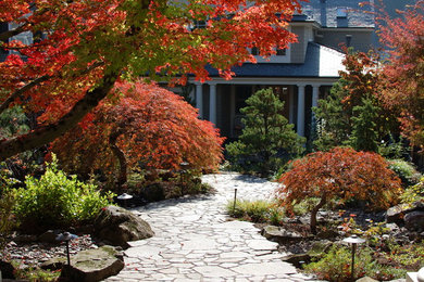 This is an example of a small rustic courtyard stone landscaping in Portland.