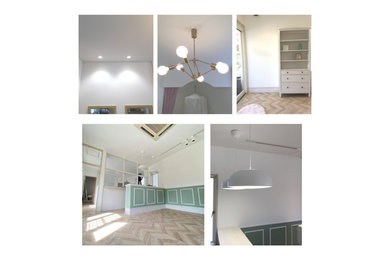 他の地域にある中くらいなトランジショナルスタイルのおしゃれなシアタールーム (白い壁、クッションフロア、ベージュの床) の写真