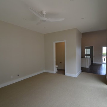 Second living area with half of bath and view of the courtyard.