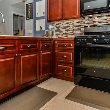 Cherry Raised Panel Kitchen Cabinets