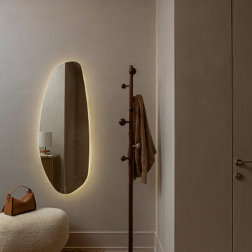 Aurelia Residence | Contemporary Condo Entry & Illuminated Mirror