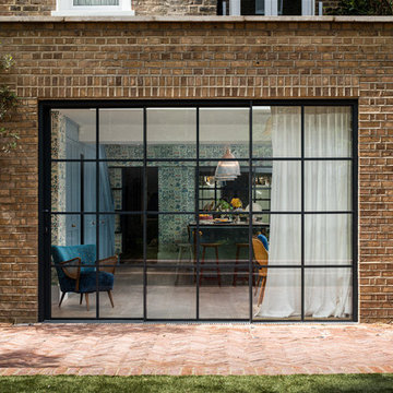 Slimline aluminium sliding doors with glazing bars for Crittal effect