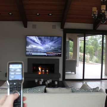 Use just ONE remote to control your TV, whole-house music, lighting, security an