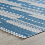 Kosas Home - Boulder Indoor Outdoor Handwoven Stripe Blue Area Rug, Blue, 8x10 - Handwoven with soft, weather-resistant materials, this handsome rug pulls any space together with its casual appeal. Tidy bands of stoney blue and gray add sublte color that complements any color palette while effortlessly enhancing any decor.