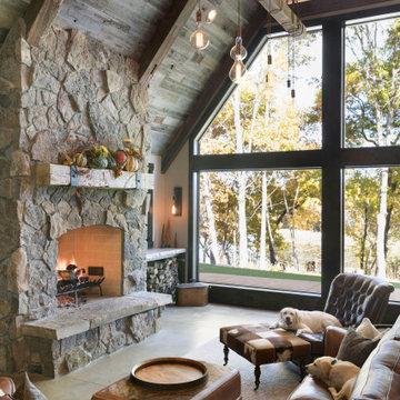 Reclaimed Wood Mantel, Beams, and Paneling in Vaulted Modern Farmhouse Home
