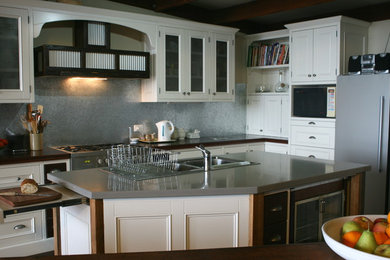 This is an example of a country kitchen in Other.