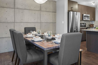 Inspiration for a mid-sized contemporary dark wood floor and brown floor great room remodel in Orange County with gray walls