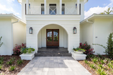 Beach style home design photo in Jacksonville
