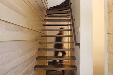 Contemporary staircase in Boston with open risers.