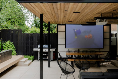Design ideas for a medium sized contemporary back garden in Manchester.