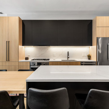 Sophisticated matte black and warm rift cut oak collision