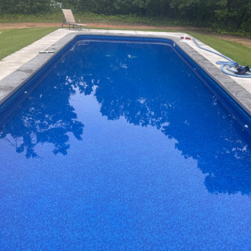 Polymer Vinyl Liner Pool with stamped/colored Concrete Cantilever Edge Coping