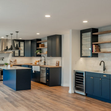 Open-Concept Great Room with Navy Kitchen and Seamless Social Flow