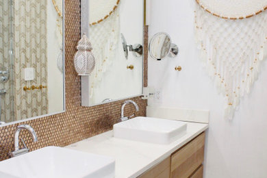 Example of a mid-sized eclectic kids' brown tile and glass tile cement tile floor, gray floor and double-sink bathroom design in New York with light wood cabinets, a wall-mount toilet, white walls, a pedestal sink, quartz countertops, a hinged shower door, white countertops and a floating vanity