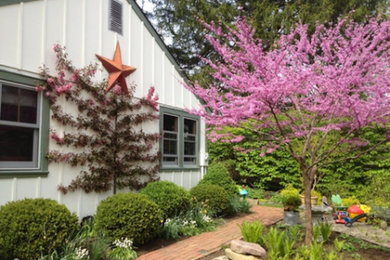 Mid-sized cottage gray two-story wood exterior home photo in Philadelphia