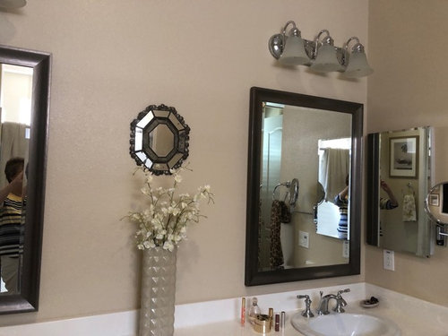 small mirror with lights