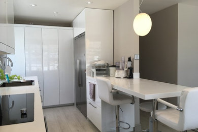 Design ideas for a contemporary kitchen in Sussex.