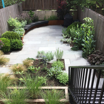 Modern Garden with Curved Corten Border