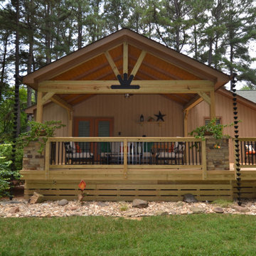 Raleigh Rustic Porch With Stone Accents, Decorative Brackets and Rain Chains