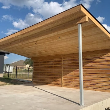 Cover patio with a privacy fence with tongue and groove ceiling