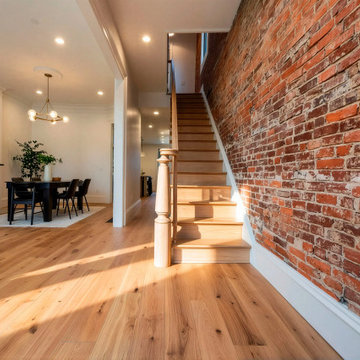 Modern Loft Staircase with Custom Turned Newel Posts