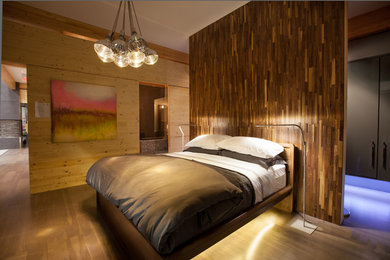 This is an example of a contemporary bedroom in Toronto.