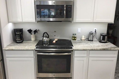 Example of a transitional kitchen design in Miami