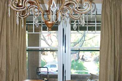 Mid-sized elegant carpeted dining room photo in Denver with yellow walls