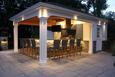 Elegant backyard patio photo in New York
