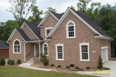 Example of an exterior home design in Other