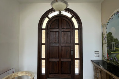 Beach style entryway photo in Miami