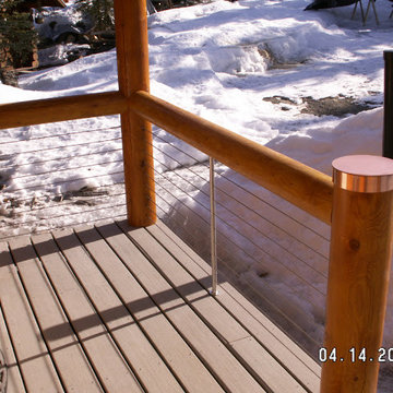 Kenai, AK Peeled Wood Posts and Top Rail with Steel Posts and Cable Infill