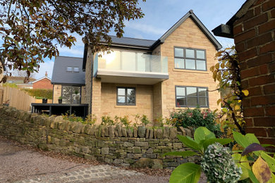 This is an example of a contemporary house exterior in Manchester.