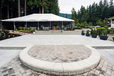 Design ideas for a huge french country full sun courtyard concrete paver landscaping in Vancouver for summer.