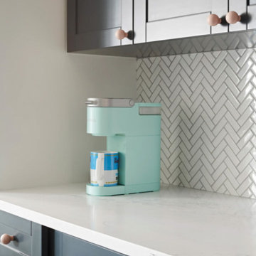 Mrs. Ross's Corner compact kitchen with pop of yellow