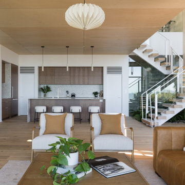 Open-plan with floating white stair, indoor garden - Fold House Berkeley Hills